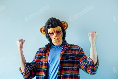 Preview: Man in monkey mask gesturing.