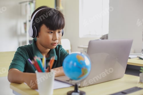 Preview: Boy Engaged in Remote Learning At Home