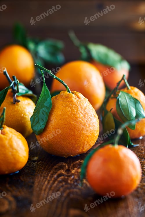 Preview: pile of oranges on wooden table
