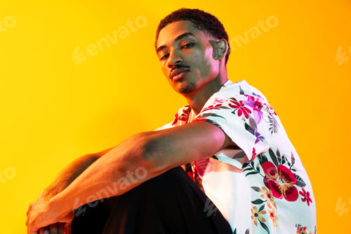 Preview: African man portrait in studio on colorful background