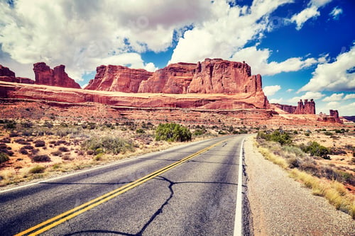 Preview: Vintage toned picture of a scenic road, USA.
