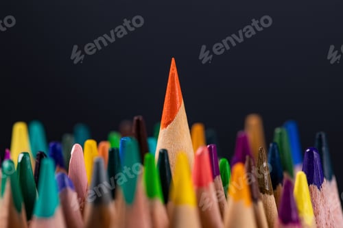 Preview: Selective focus shot of colorful pencils on black background