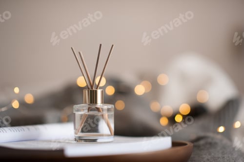 Preview: Cozy home atmosphere with perfume and candle