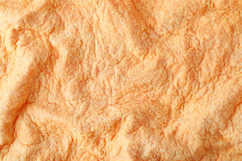 Preview: Orange crumpled wool felt fabric texture background