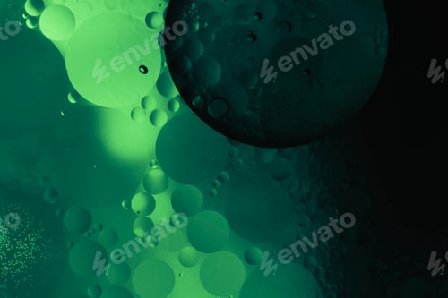 Preview: dark abstract liquid background with glowing green light