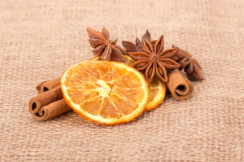 Preview: Oranges and cinnamon isolated on tissue background