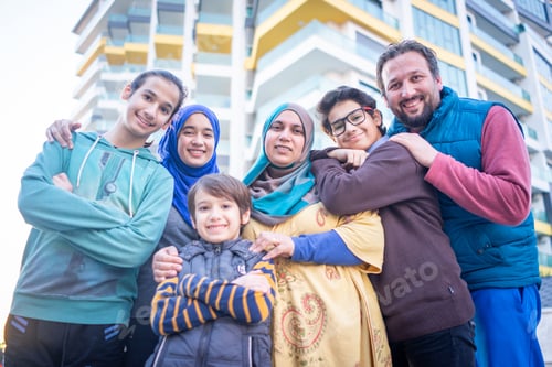 Preview: Real Muslim family on city street portrait