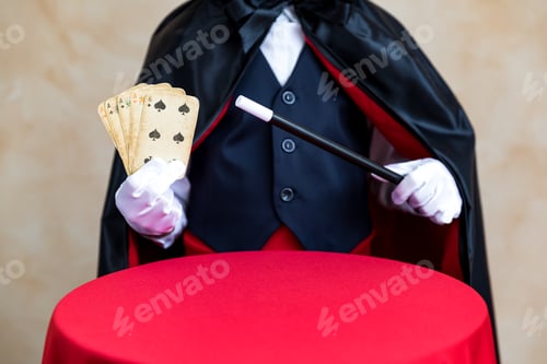 Preview: Illusionist holding magic wand and playing card