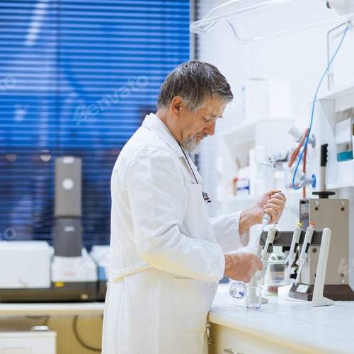 Preview: senior male researcher carrying out scientific research in a lab