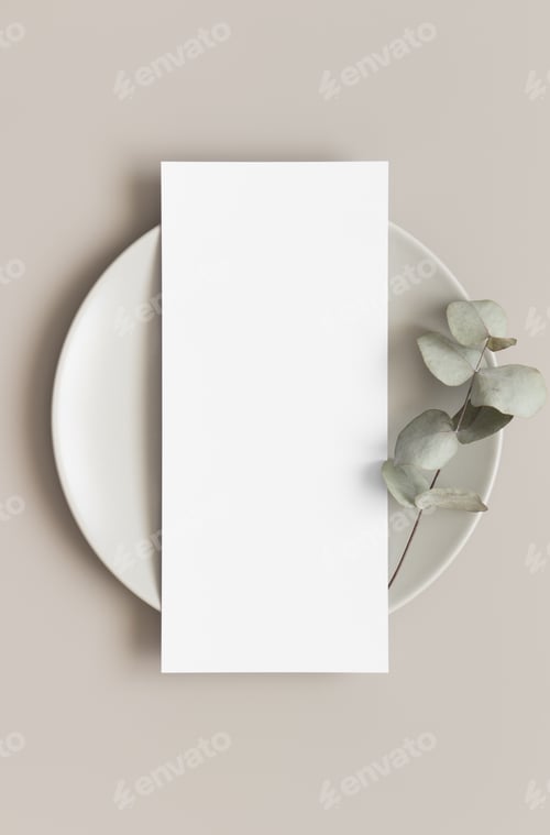Preview: Menu card mockup with a eucalyptus branch on a plate, 4x9 ratio.