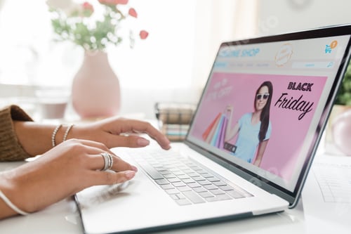 Preview: Hands of young woman over laptop keypad going to surf through online goods