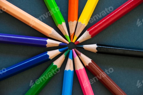 Preview: Rainbow coloured pencils arranged in a circular pattern