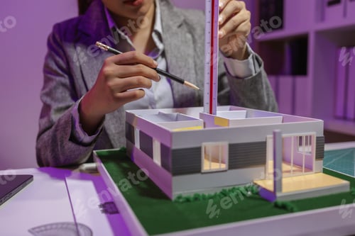 Preview: a passionate female architect works in her private office to remodel a house