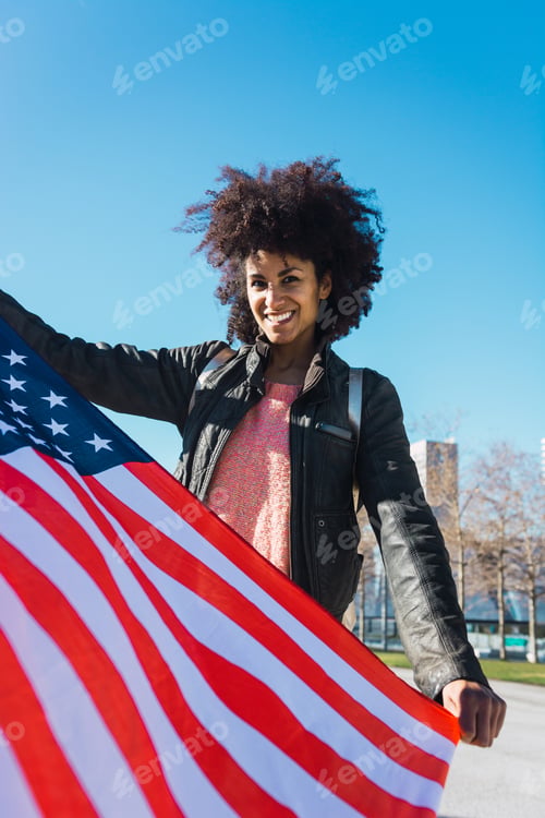 Preview: black woman with afro hair and an american flag