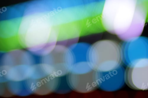 Preview: Blue, Red, Yellow, Blue, White Blurred Festive Bokeh Background With Stars For Christmas