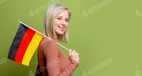 Preview: Beautiful woman with flag of Germany