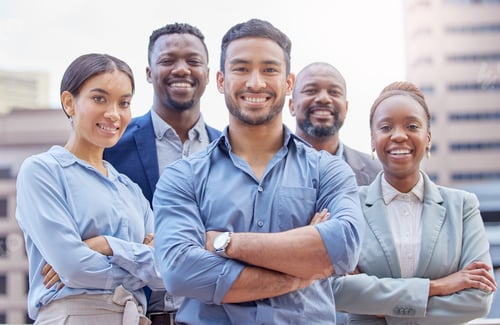 Preview: Shot of a group of businesspeople standing with their arms crossed against a city background