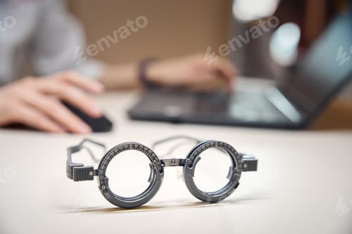 Preview: Special glasses with trial lenses lie on the ophthalmologists desk
