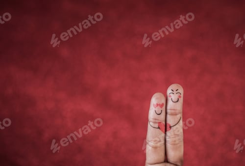 Preview: Finger with emotion on red background