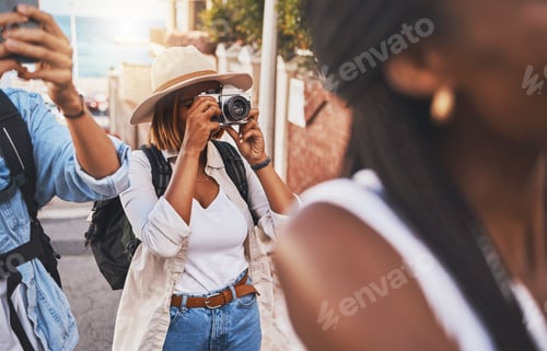 Preview: Travel, tourism and photograph with a woman tourist taking a picture while on holiday, vacation or