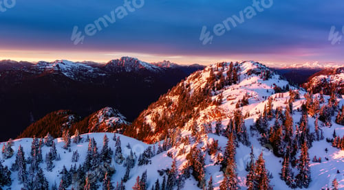 Preview: Canadian Mountain Landscape covered in snow. Winter Season.