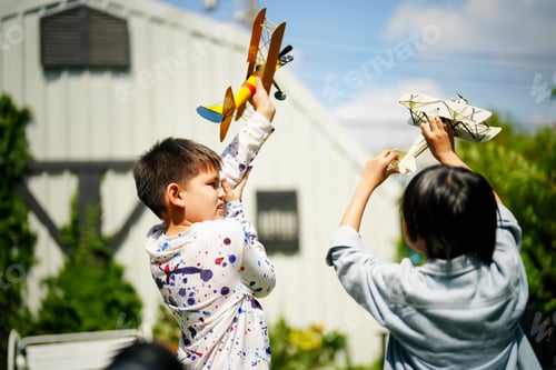 Preview: Happy childhood. Two kids playing together.