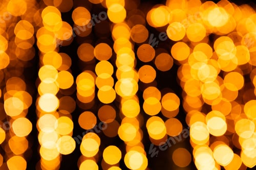 Preview: Festive bright blurred golden black background Christmas. yellow bokeh lights shining out of focus