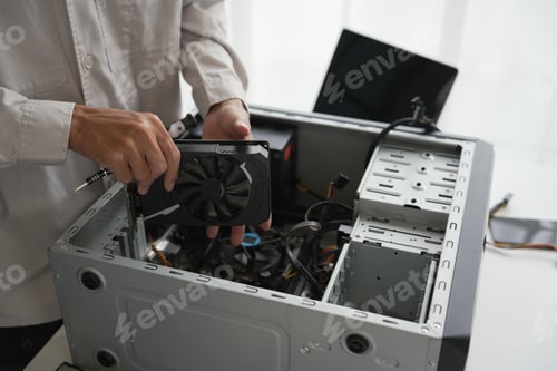 Preview: Computer Hardware dissemblers fixing computer PC.