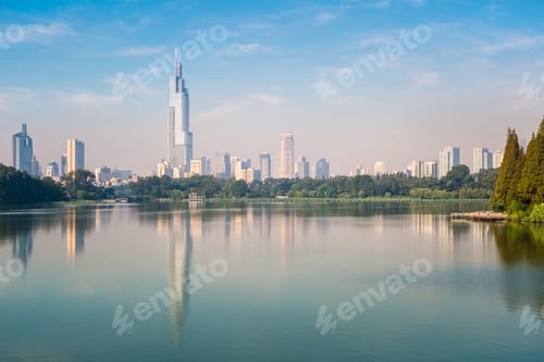 Preview: modern city building reflected in the lake