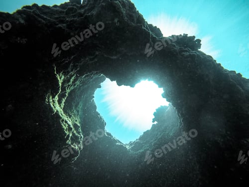 Preview: Underwater beautiful shot of coral reefs and rocks forming a little heart - beautiful wallpaper