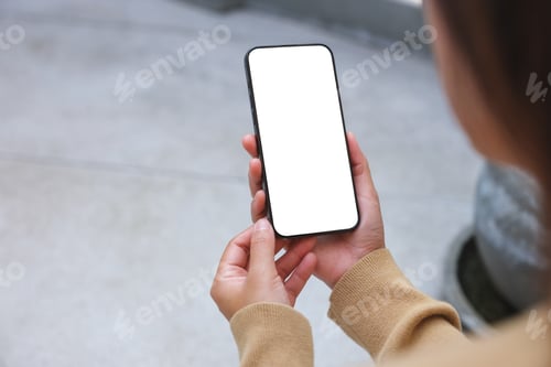 Preview: Mockup image of a woman holding mobile phone with blank desktop white screen