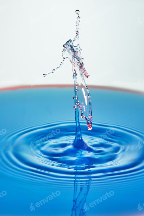 Preview: Abstract background of splash of color water, collision of colored drops