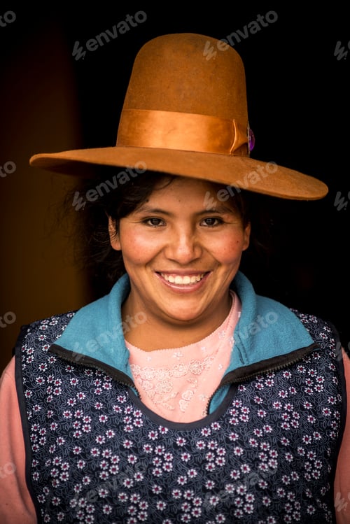Preview: Smiling woman with a stylish brown hat