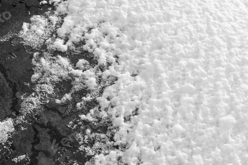 Preview: Abstract Friable Texture Of Sparkling Snow Of White Color On Dark Glass