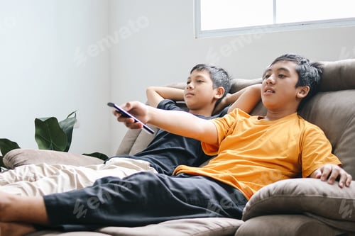 Preview: Two Young Boys Enjoy Watching Together