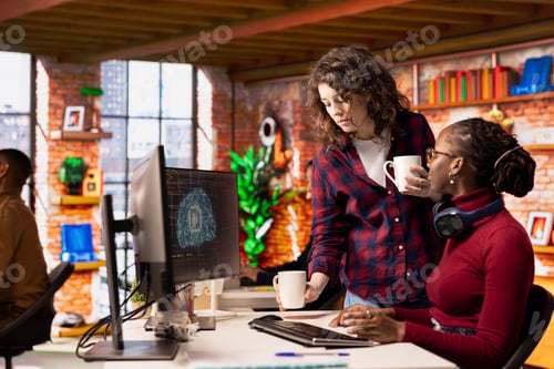 Preview: Teamworking startup office colleagues using artificial intelligence technology