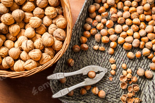 Preview: Autumn harvest of nuts in wicker baskets