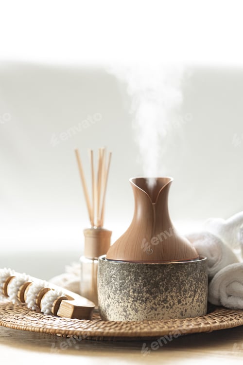 Preview: Essential oil aroma diffuser humidifier diffusing water articles in the air.
