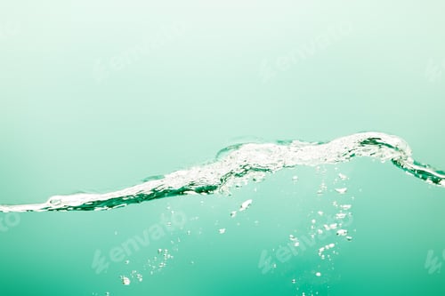 Preview: transparent pure water with splash and bubbles on green background
