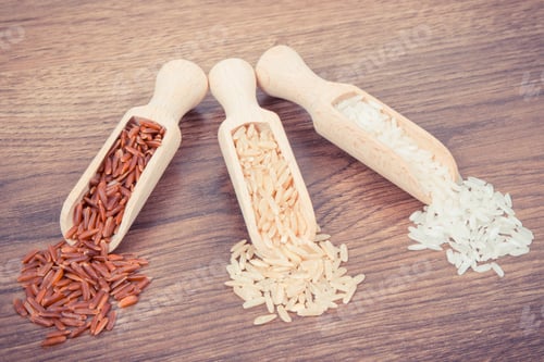 Preview: Vintage photo, Red, brown and white rice on wooden scoop, healthy nutrition concept