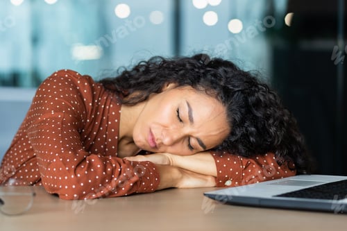 Preview: Beautiful tired hispanic woman sleeping on desk, close-up business woman with closed eyes napping