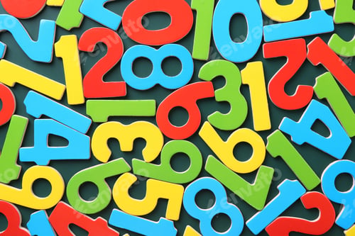Preview: Colorful numbers on green background, top view
