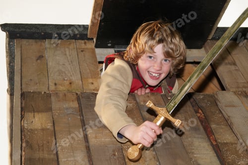 Preview: Boy playing in treehouse