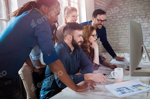 Preview: Creative coworkers working in office