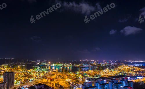 Preview: Cityscape with distant view of container terminal at night, Singapore, South East Asia
