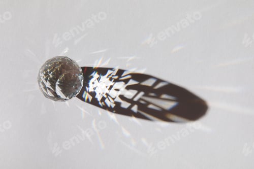 Preview: Glass geometric figures prisms with light diffraction of spectrum colors and complex reflection