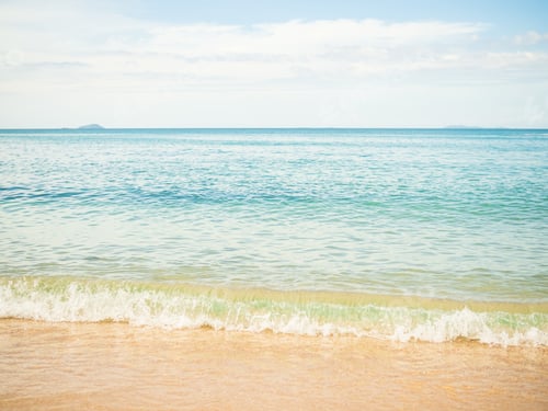 Preview: White Wave Sea Summer on Sand Beach with Blue Sky Background