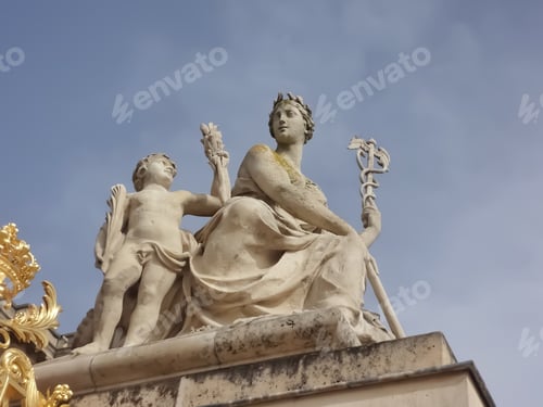 Preview: A Close up picture of a sculpture at the entrance to the Palace of Versailles