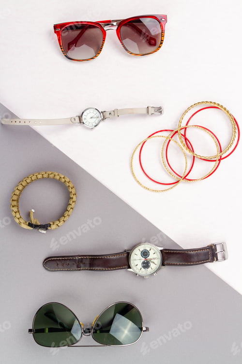 Preview: Flat lay contrast of mens and womens accessories.