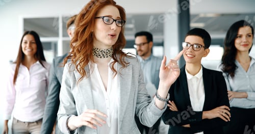 Preview: Happy business people celebrating success